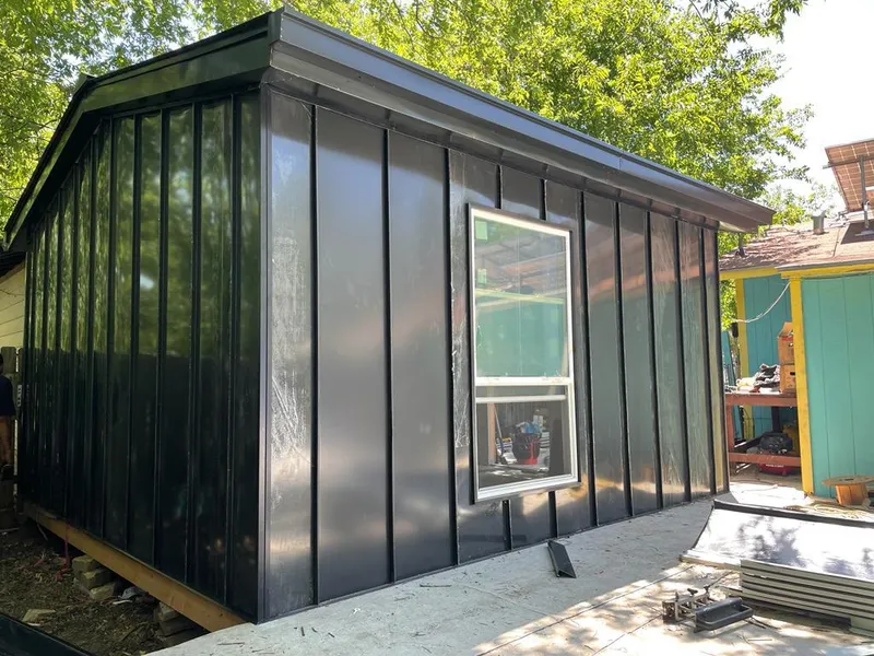 Black standing seam metal wall panels for Metal Roof Installation in Vienna